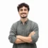 Smiling man in a gray shirt with crossed arms